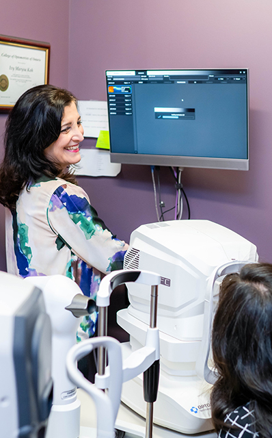 optometrist conducting eye exam